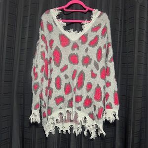 Distressed leopard sweater